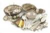 ëA mixed lot of electroplated items, comprising: a wine funnel, three toast racks, various entrée dishes, four basting spoons and quantity of electroplated flatware. (qty)