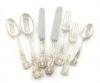 An American silver canteen for six, by Tiffany and Co., Edward Moore period, circa 1890, the terminals with an initial, comprising: six table forks, six dessert forks, six dessert spoons, six table knives, six dessert knives, three tablespoons, two teaspo