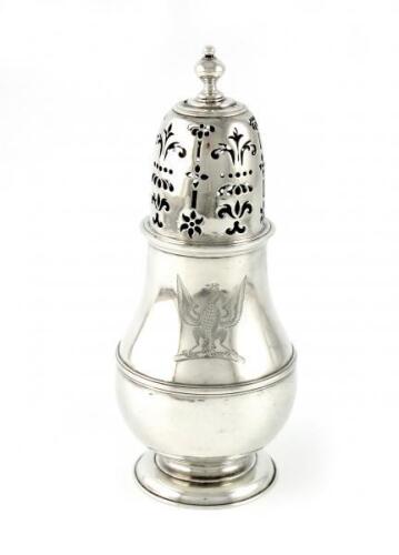An early 18th century silver sugar caster, by Richard Watts, London, date letter worn, baluster form, central girdle, pull-off pierced cover, with a knop finial, height 19cm, approx. weight 8oz.