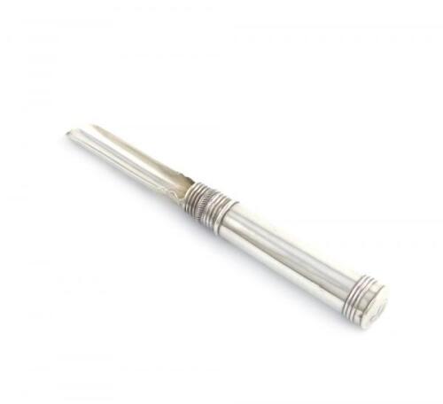 A William IV silver travelling apple corer, by Taylor and Perry, Birmingham 1834, tapering circular handle, with fluted bands, screw-in corer, full length 11.3cm, approx. weight 0.3oz.