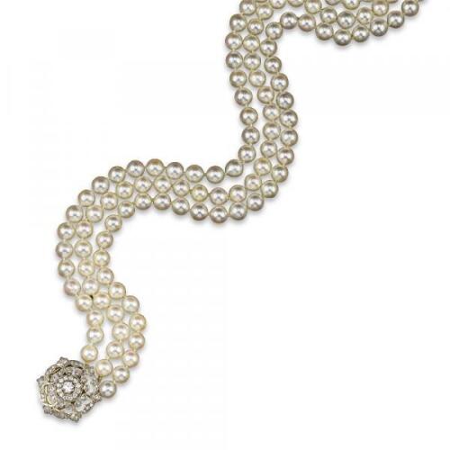 A three row cultured pearl necklace, set with a detachable Victorian diamond cluster clasp in silver and gold, the necklace 41cm longest, clasp 2.8cm wide