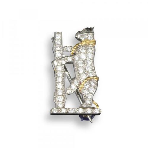 A Regimental brooch for the Warwickshire Yeomanry, by Garrard, pave-set with circular-cut diamonds in 18ct yellow and white gold, maker's mark and Birmingham hallmarks for 1989, 3cm high, with a similar silver brooch for the Warwickshire Yeomanry, set in 