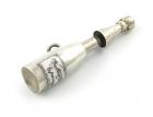 A Victorian novelty silver and enamel pencil, unmarked, modelled as champagne bottle, enamelled label, with a ring attachment, length 6.2cm. Provenance: The KB Collection of Pencils. Illustrated in Bull, K., The KB Collection of Pencils, private publicat - 2